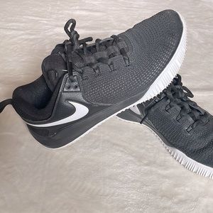 Nike volleyball shoes. Black with checkmark.